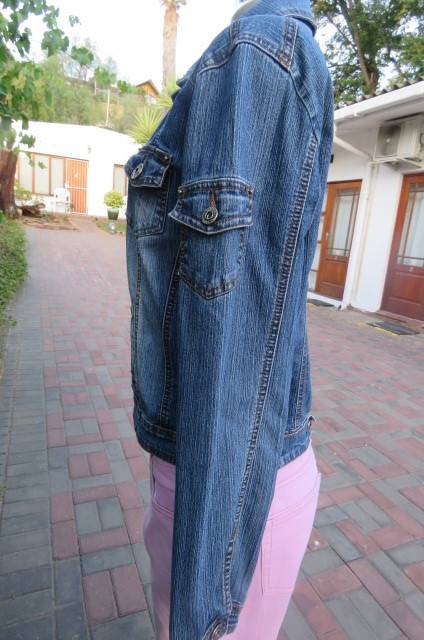 Cheecky biker style denim jacket size 36/12. In polycotton stretch fabric by 'Network'