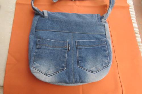 Hand blue denim bag with 3 zipped up departments. Made from used jeans size 30x30 cm.