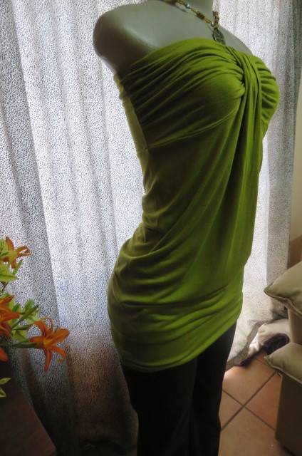 Strapless bright avogreen long top by `Woolworths` in size 34/10. Band over hips. In stretch cotton.
