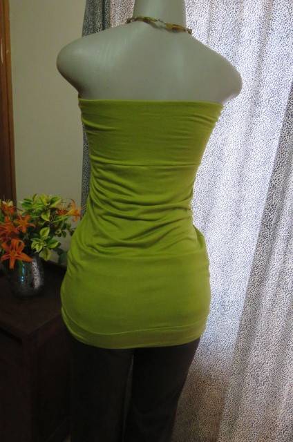 Strapless bright avogreen long top by `Woolworths` in size 34/10. Band over hips. In stretch cotton.