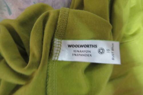 Strapless bright avogreen long top by `Woolworths` in size 34/10. Band over hips. In stretch cotton.
