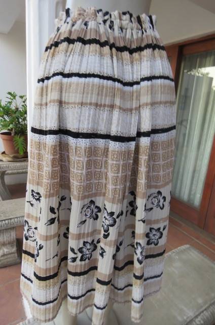 Permanent pleated beige, cream and black horizontal pattern striped skirt by 'Inca' size 50/26.