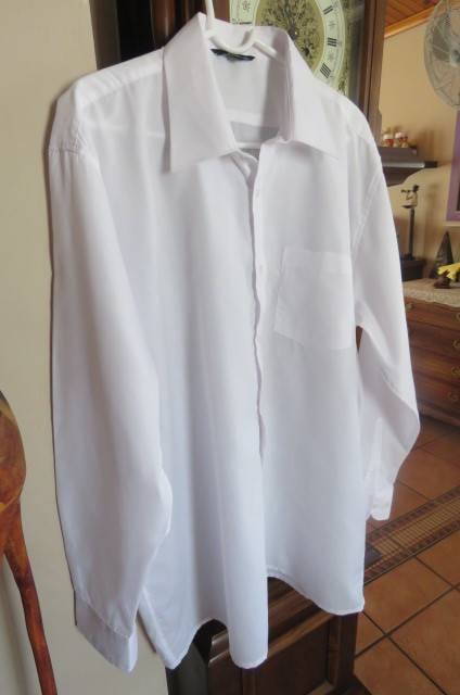 White men's long sleeve shirt by 'Banned'. Front pocket size XL-chest 127 cm. In polycotton fabric.