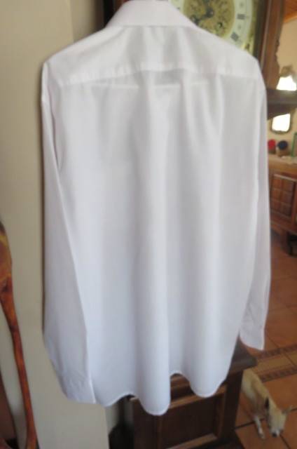 White men's long sleeve shirt by 'Banned'. Front pocket size XL-chest 127 cm. In polycotton fabric.