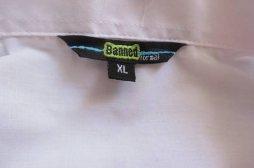 White men's long sleeve shirt by 'Banned'. Front pocket size XL-chest 127 cm. In polycotton fabric.