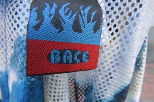 Sporty casual shirt by 'Bace' in size 40/16. In nylon and polyester blend with gauze stripes.