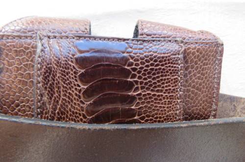 Genuine leather brown belt with holder. Length 108 cm. Made in Europe. Used but in good condition.