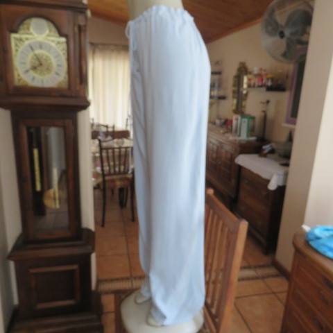 Comfy baby blue long pants in cotton and viscose blend. Elasticated waist back. Size 40/16