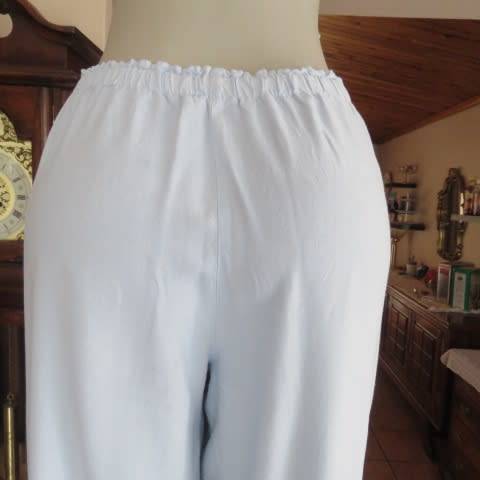 Comfy baby blue long pants in cotton and viscose blend. Elasticated waist back. Size 40/16