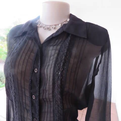Dainty long sleeve black sheer polyester top made for OASIS in India. With lace inlays on front.
