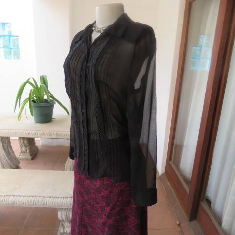 Dainty long sleeve black sheer polyester top made for OASIS in India. With lace inlays on front.