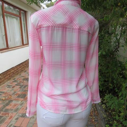 Soft and silky white and pink check long sleeve blouse in 100% polyester chiffon. Size 30 As new