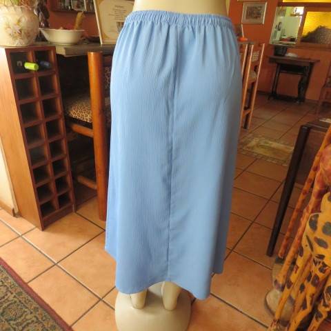 Sapphire blue button down vintage skirt by FASHIONETTE in size 36/12.Elasticated waist back.