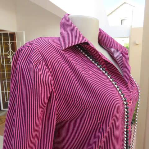 Pretty styled long sleeve blouse in magenta pink and black vertical stripes. By RT in size 38/14