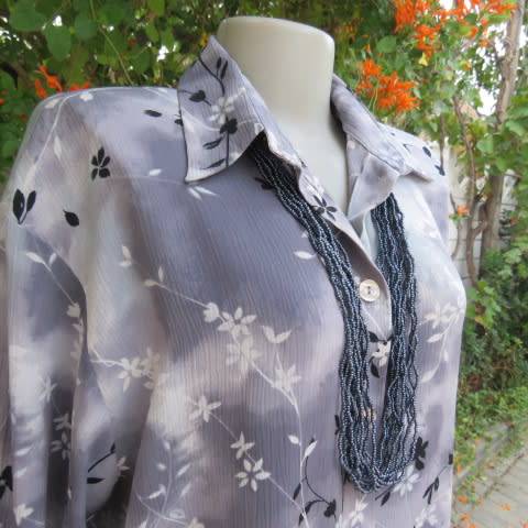 Silver and darker grey coloured long sleeve top with black and white floral pattern, Size 42/18