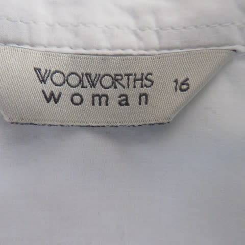 White as new short sleeve 100% cotton ladies shirt. Yoked with tucked decoration. Size 40/16.