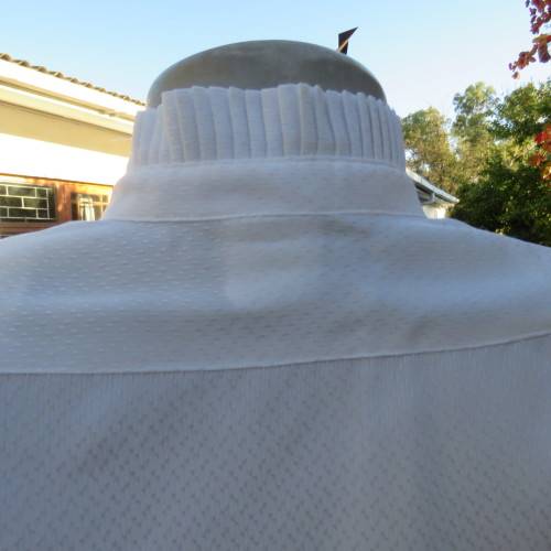 Feminine white vintage blouse from the 80's. By FOSHINI size 36/12.High pleated neckline.As new