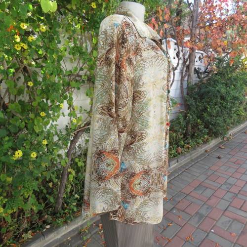 Smart casual size 44/20 ANNA PIA slip over top in tasteful colours and print. Wide sleeves.As new