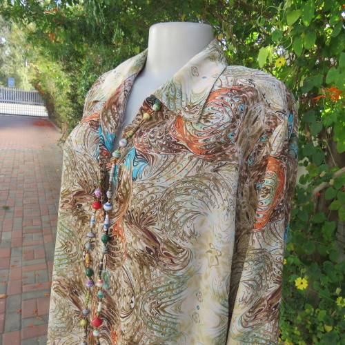 Smart casual size 44/20 ANNA PIA slip over top in tasteful colours and print. Wide sleeves.As new