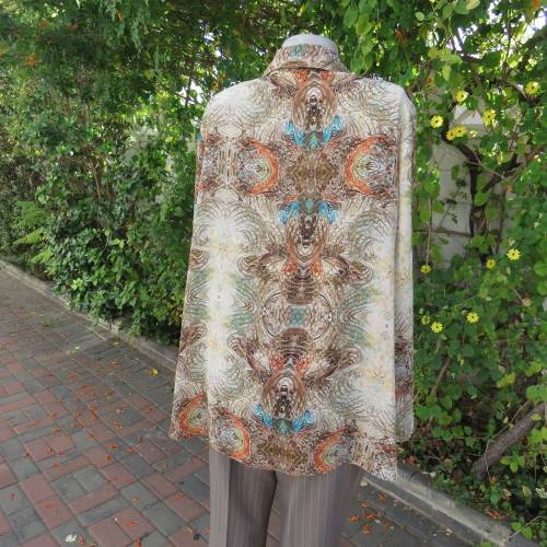 Smart casual size 44/20 ANNA PIA slip over top in tasteful colours and print. Wide sleeves.As new
