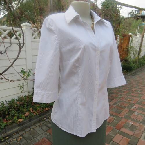 Ageless 'Kelso Career' top with elbow length cuffed sleeves size 36/12. Yoked back. New condition.