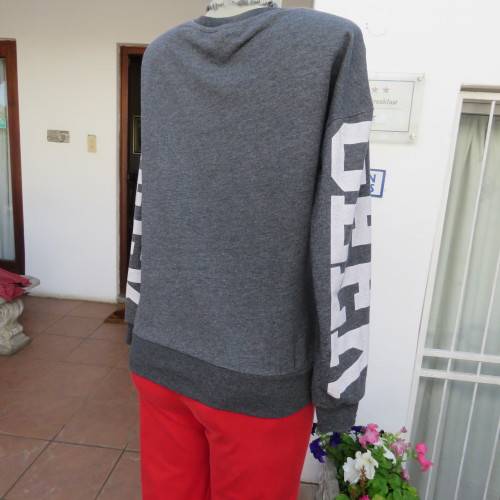 GEEK long sleeve grey top with white logo. Slip over.  Size 36/12. By Atmosphere. Good condition.