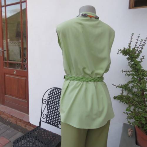 Sleeveless mint green button down top high banded collar. Size 38/14. By WOOLWORTHS. Good condition.