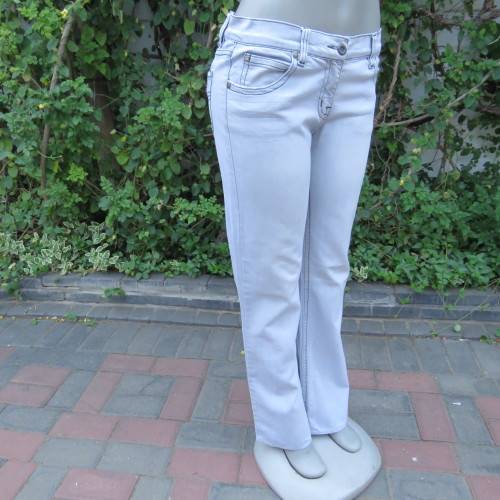 Sexy light blue denim jeans. Easy bootcut style by `Paris`. Size 36/12. Used but in good condition.