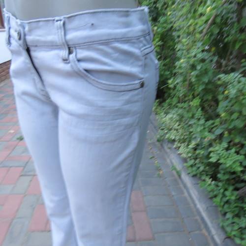 Sexy light blue denim jeans. Easy bootcut style by `Paris`. Size 36/12. Used but in good condition.