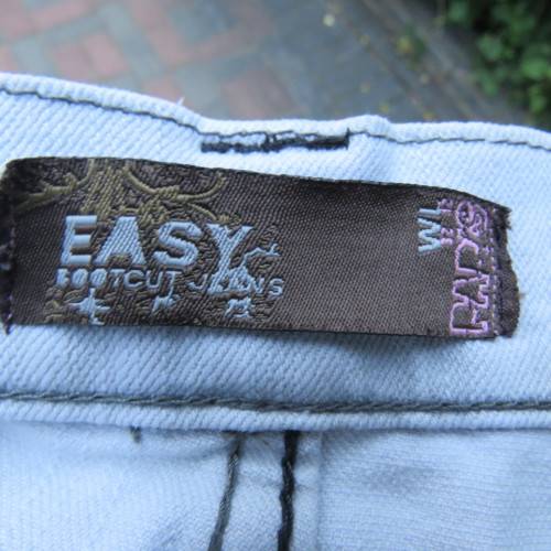 Sexy light blue denim jeans. Easy bootcut style by `Paris`. Size 36/12. Used but in good condition.
