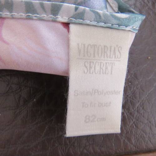 `Victoria Secret` satin night top in cami style. With adjustable straps. Size 30/6. New condiiton.