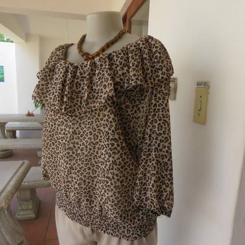 Pretty animal print slip over top in rich cream and brown sheer polyester.By EDGE size 42/18