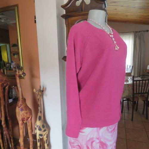 Get noticed in this rose pink slip over Knit by JAQUELINE DE YONG. Size 40/16. In as new condition.