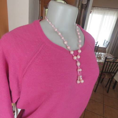 Get noticed in this rose pink slip over Knit by JAQUELINE DE YONG. Size 40/16. In as new condition.