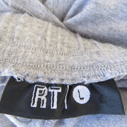 Modern easy to wear silvergrey high/low skirt by RT size 36 to 38. Yoked with elasticated waist.
