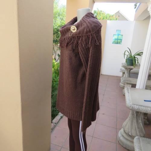 Fabulous acrylic doubleknit slip over cardigan in golden brown with some shine.Size 42/18. As new