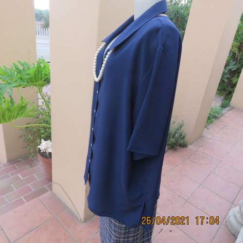 Silky navy 100% polyester short sleeve button down V neck top with Johnny collar.Size 50/26
