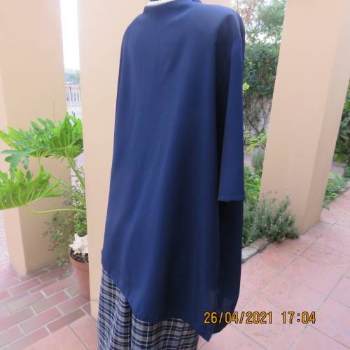 Silky navy 100% polyester short sleeve button down V neck top with Johnny collar.Size 50/26