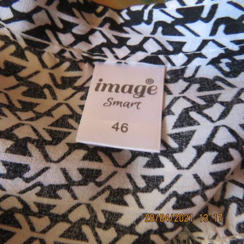 Trendsetting slip over top in black and white small patterns.Size 46/22 by IMAGE.100% viscose.As new