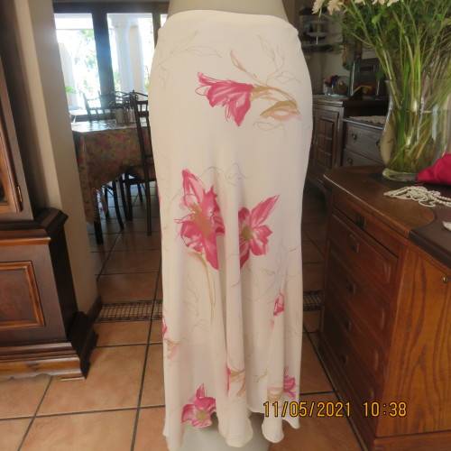 Timeless cream sheer polyester straight maxi skirt with bold pink flowers Size 48/24.As new