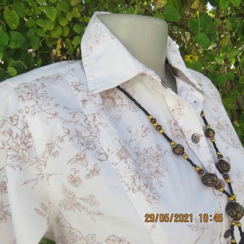 High class white stretch cotton long sleeve shirt with brown floral design.Size 34/10 by TRUWORTHS.