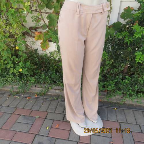 Elegant latte beige pants from WOOLWORTHS size 34/10 with space.Straight legs.Good condition.