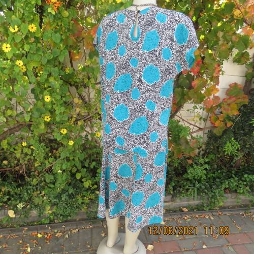 Smart monochrome dress with turquoise flower posies. Size 38/14 by STUDIO 1 N Y.Overlay top.As new.