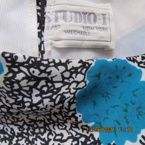 Smart monochrome dress with turquoise flower posies. Size 38/14 by STUDIO 1 N Y.Overlay top.As new.