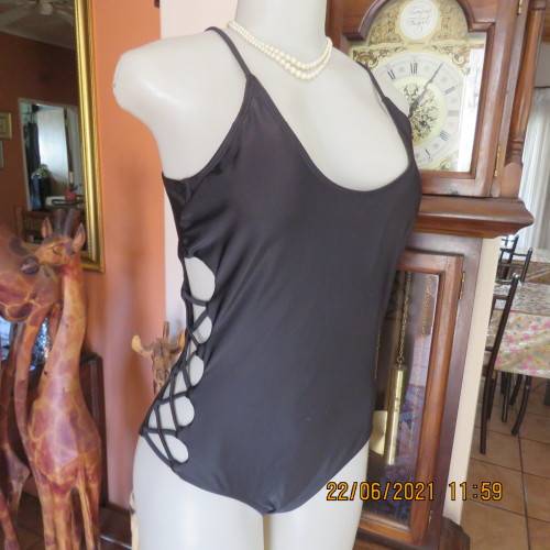 Sexy black one piece swimsuit by MAUI and SONS from USA. Size XL. Braided sides.New condition