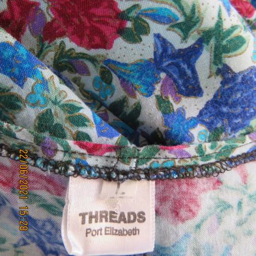 Cheerful loose easy to wear 100% viscose dress with blue/red flowers.By THREADS size 40 to 42.As new