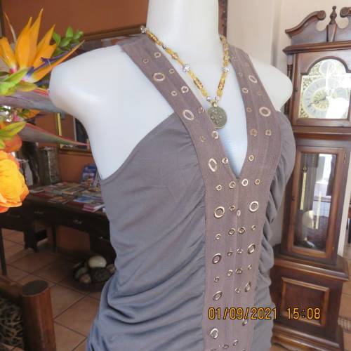 Sexy long dark olive green top by LEGIT 34/10.Vertical cotton band on front with stud decoration