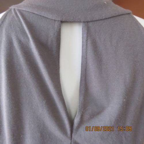 Sexy long dark olive green top by LEGIT 34/10.Vertical cotton band on front with stud decoration