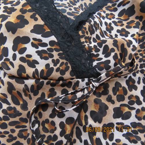 Animal print top by RT Denim, size 30, adjustable thin straps, fold over bust