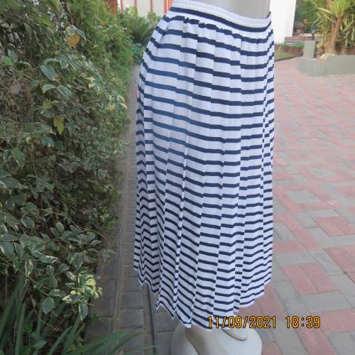 Make a statement in this white+navy horizontal striped skirt. By WOOLWORTHS in size 38/14. As new